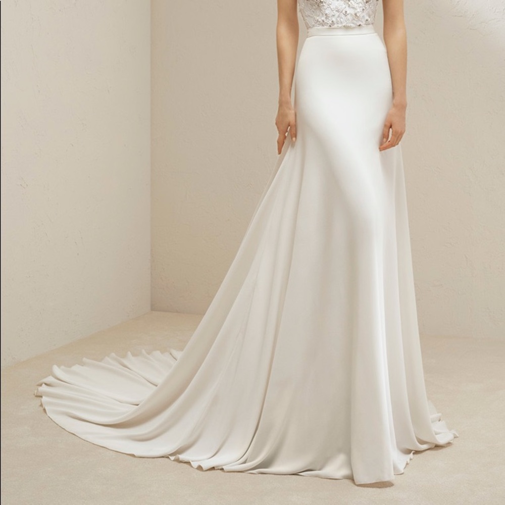 Wedding dress skirt separate. Never been worn.